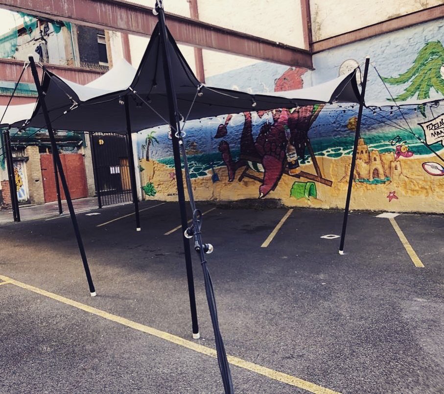 AfonEvents's tweet photo. One of our stretch tents has gone up at a secret urban setting for a soon-to-be-announced street food activation in Wales... 🤐

#stretchtent https://t.co/hFYnEEKLsC