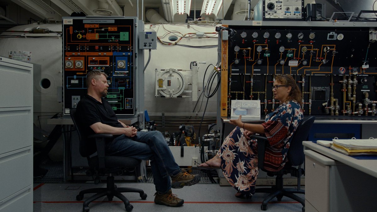 MoonlessOasis's tweet photo. Hamish Tweed &amp; Sherri Ferguson, MSc discuss the physiological issues that affect divers at great depths, in front of the Hyper/Hypobaric Chamber at Simon Fraser University. There is still a lot to learn about how we react to these extreme environments.
#glasssponge #scuba #yvr https://t.co/5pLqZTGj8s