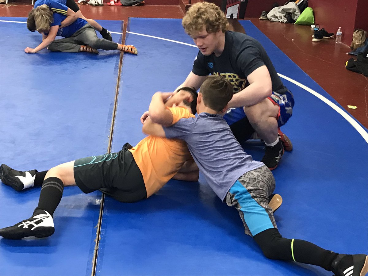 DavidNutter16's tweet photo. It’s that Topper Nation!!! This is what it’s all about. Past Toppers helping future Toppers. State Champions, Chase Deal and Luke Story, make a surprise holiday visit while home from college to give some pointers to our Patriot wrestlers. @SHHS_JCS @KeithTurner44 @jcityTNschools https://t.co/TMjDqpnh4F