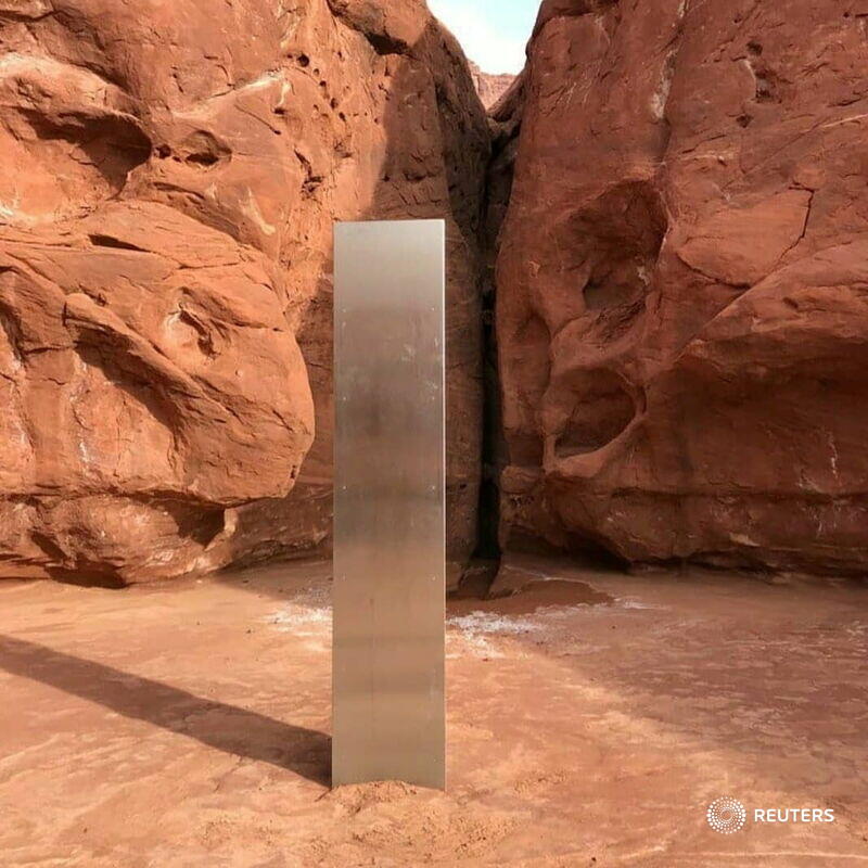 reuterspictures's tweet photo. Space oddity? Shiny monolith in the middle of the Utah desert mystifies helicopter crew looking for bighorn sheep last week https://t.co/zgs9BpoI4S https://t.co/EEtDs8WroD