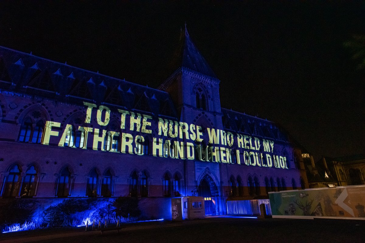 Pitt_Rivers's tweet photo. As we near the end of a strange and turbulent year, 
@luxmuralis used the facade of @morethanadodo &amp; @Pitt_Rivers to pay tribute to @NHSuk at the launch of @oxlightfest20 last week - heartfelt messages as a thank you from all of us. https://t.co/T45FI4Mx0n