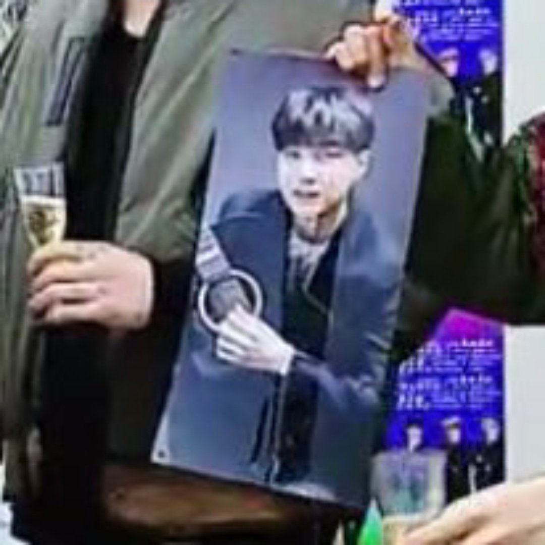 helpsjskhsks they even made his poster drink alcohol they love to tease him 