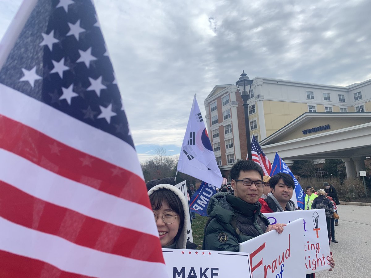 JackPosobiec's tweet image. Trump supporters lining the streets in Gettysburg ahead of today's hearing