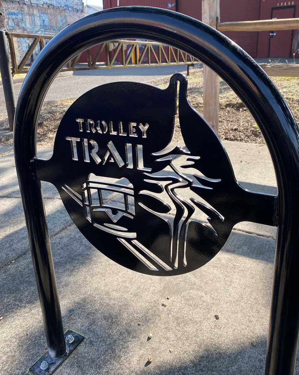 BikePortland's tweet photo. Historic Downtown Oak Grove is living up to its bikey logo by installing new bike parking and a repair station where the Trolley Trail route passes through!  https://t.co/7TrB6UJtcM https://t.co/JB5J2ionJO