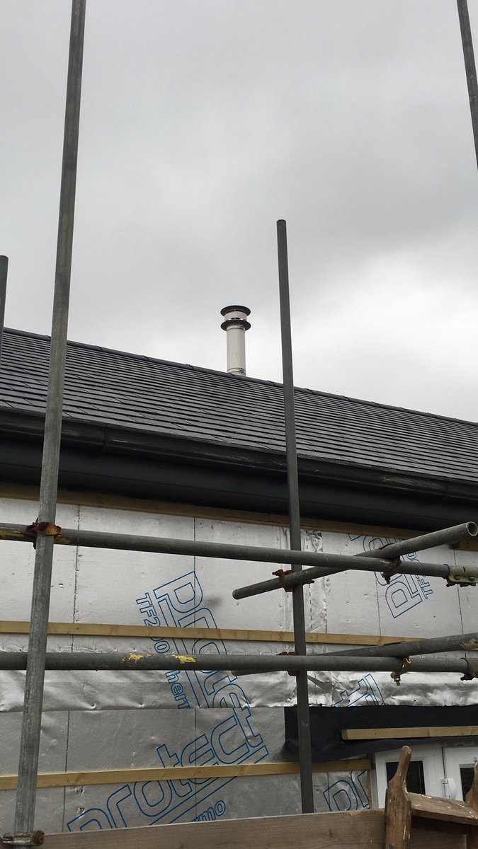 A <a href="/CharnwoodStoves/">Charnwood</a> Aire 5 wood burning stove with @Metaloterm chimney system installed into a #offgrid home on the #IsleofWight ready for winter!