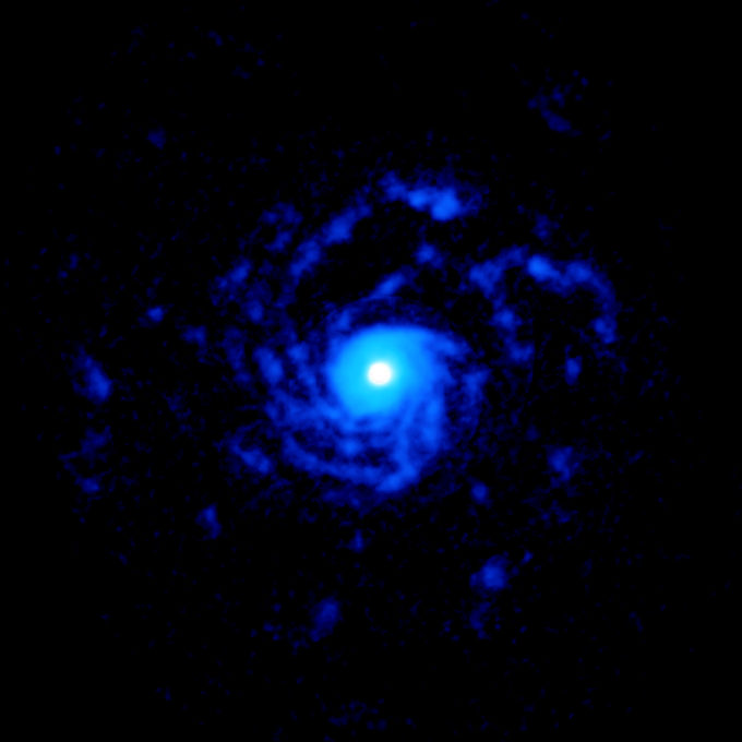 Planets are born from chaos! 💥🌀🪐 
ALMA image of the planet-forming disk around the young star RU Lup, showing a giant set of spiral arms made out of gas. The structure extends to nearly 1000 astronomical units (AU) from the star! 😱
(1 AU=149.597.871 km)
