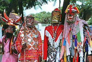 Another influence is the Junkanoo festival. Junkanoo is a masquerade festival in Jamaica believed to be attributed to the Njoku Ji (yam-spirit cult).