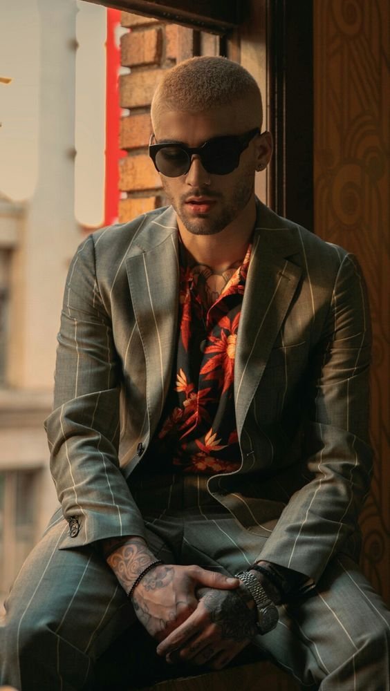 "one of the most stylish men on the planet, earth, zayn malik." agreed.