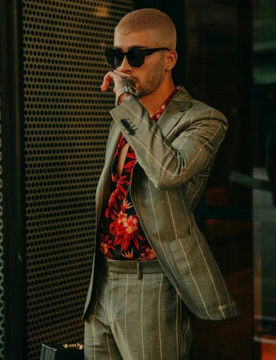 "one of the most stylish men on the planet, earth, zayn malik." agreed.