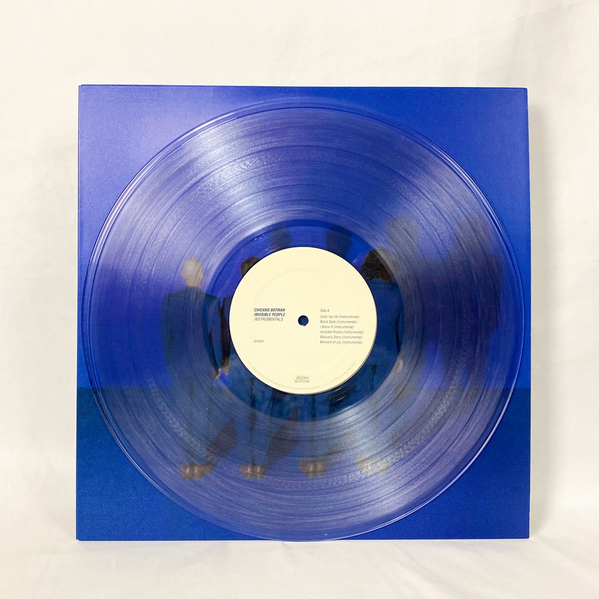 ChicanoBatman's tweet photo. Check out some pics of the 'Invisible People: Instrumentals' LP we just got our hands on.  Limited edition of 3,000 pressed onto clear vinyl available this Friday as a @recordstoreday exclusive.  Visit https://t.co/l0mmOYuFUk for more details. #rsd2020 #chicanobatman https://t.co/ZcGe4ANJT7
