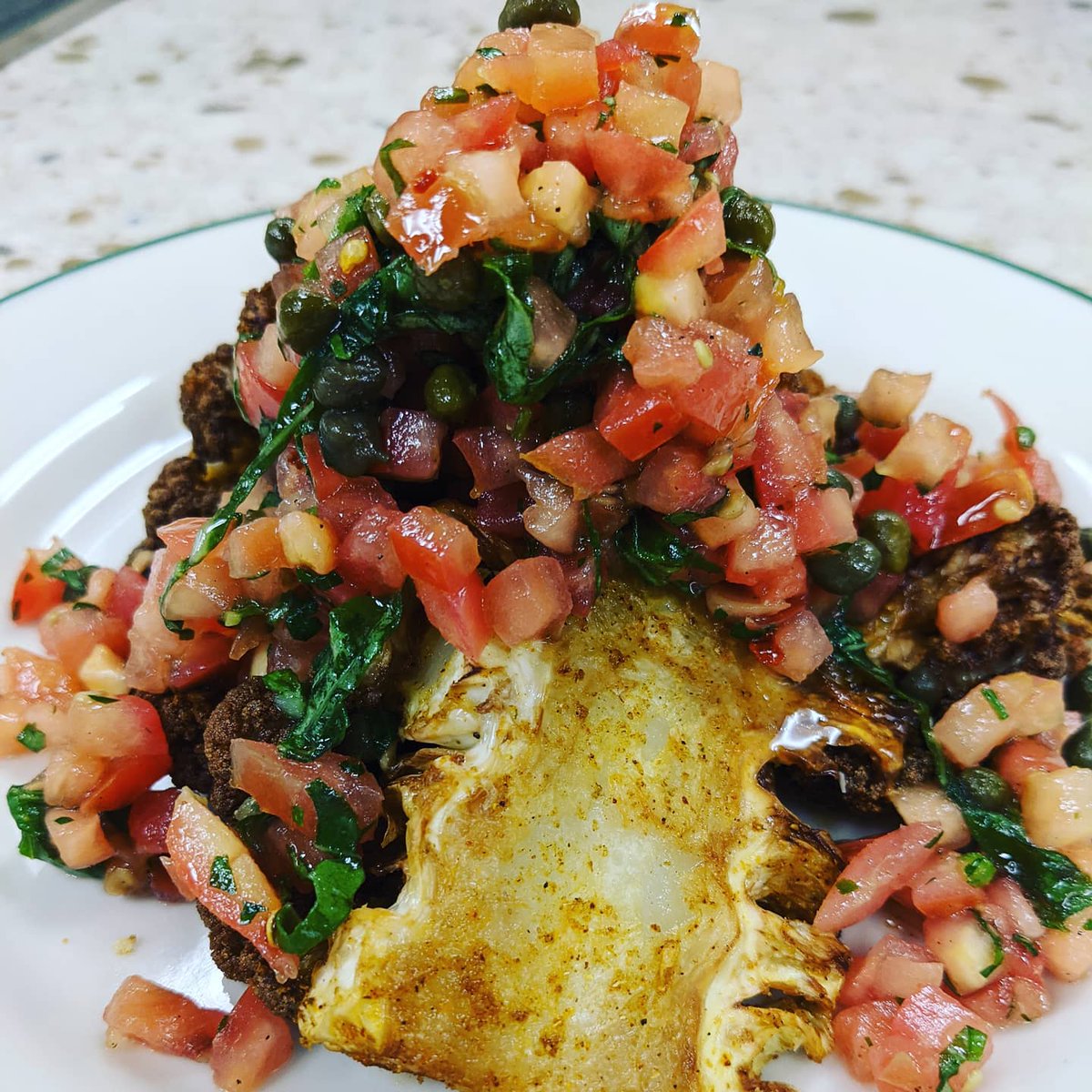 Eddie_Mundy's tweet photo. Shawarma spiced cauliflower steak w/ lemon, tomato, caper & fresh herb relish as an alternative to our grilled ribeye steaks today!
.
@FlikISDining
.
#schoollunch #chefswhim #cauliflower #cauliflowersteak #tomato #cape#cooklife #eatshareconnect #vegetarian #teampixel https://t.co/4iT6ckCI8p