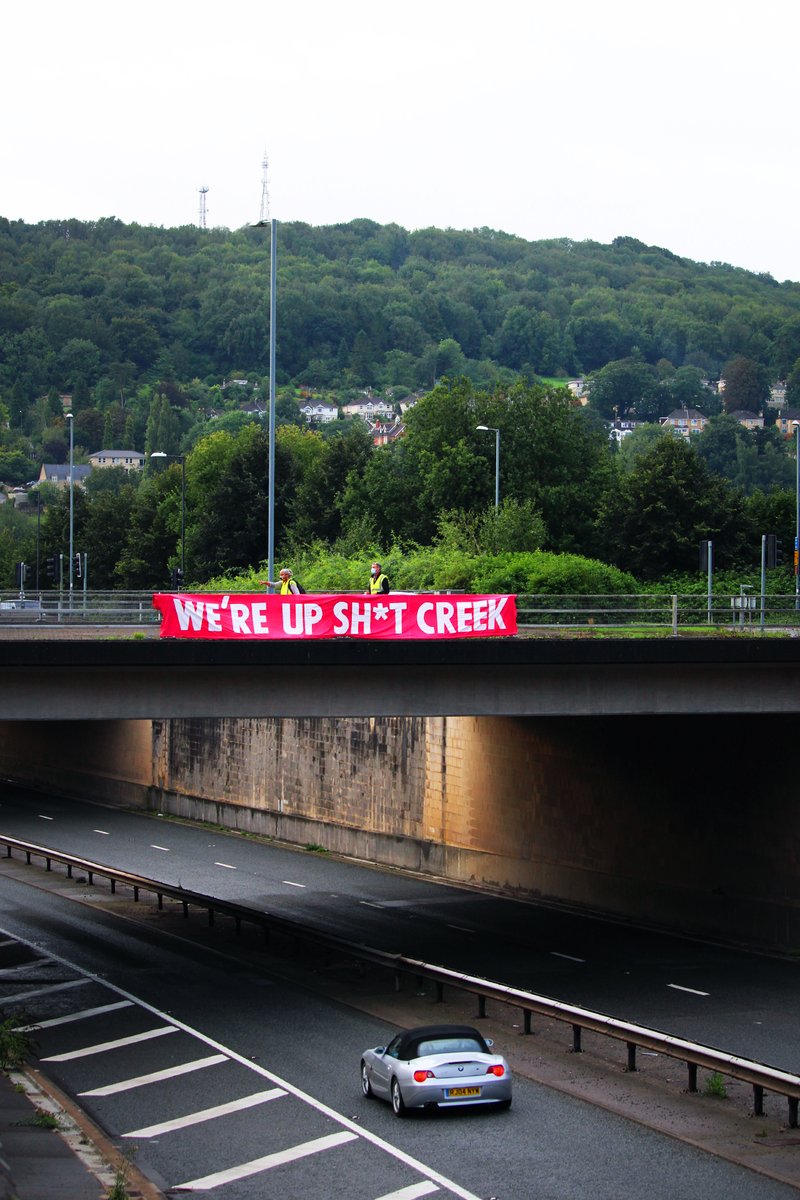  28th AUGUST • A4, NEAR BATH In the early hours, local Extinction Rebellion activists hang banners on bridges over the busy A4 dual carriageway just outside Bath, a sign motorists couldn't ignore. 