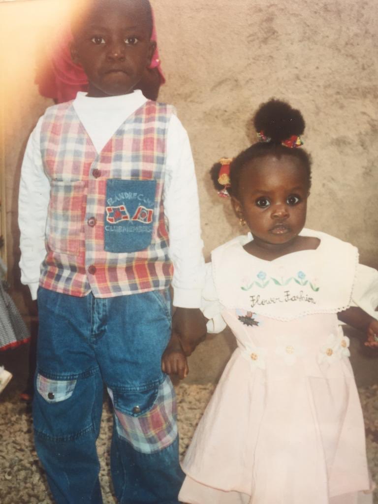 on her first birthday, we were made to take this picture. Growing up, we never attended the same schools from primary school till university but we saw each other in church from time to time. She struck me as a very pretty girl and because she was tall she was my