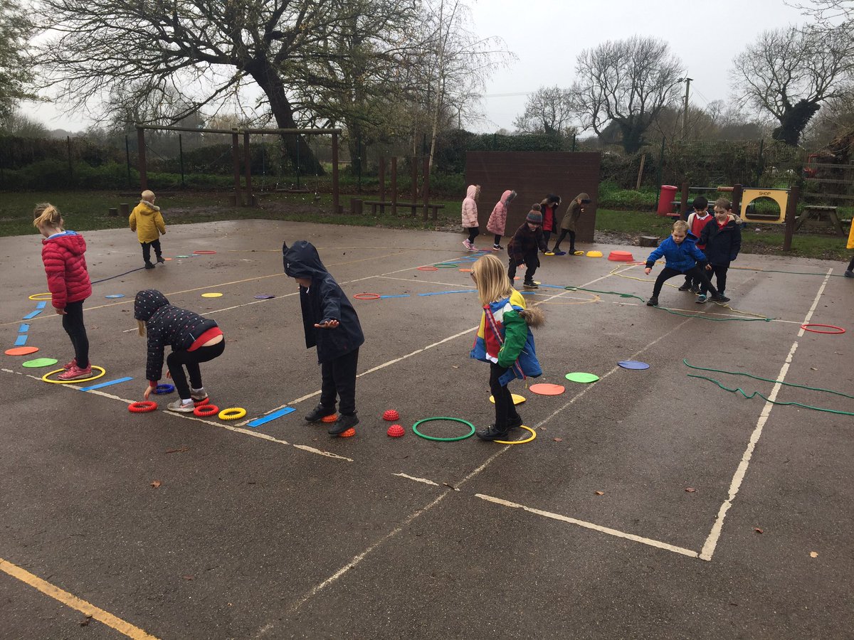 cdavidhssp's tweet photo. EYFS Robins class @PrimaryHoughton enjoying balancing skills in the rain today @HuntsSSP Regardless of the weather they just cracked on. 👍 Positive attitude being instilled so young. #covidsafe #outdoorfun #pewhatever https://t.co/lqmSbhxOmC
