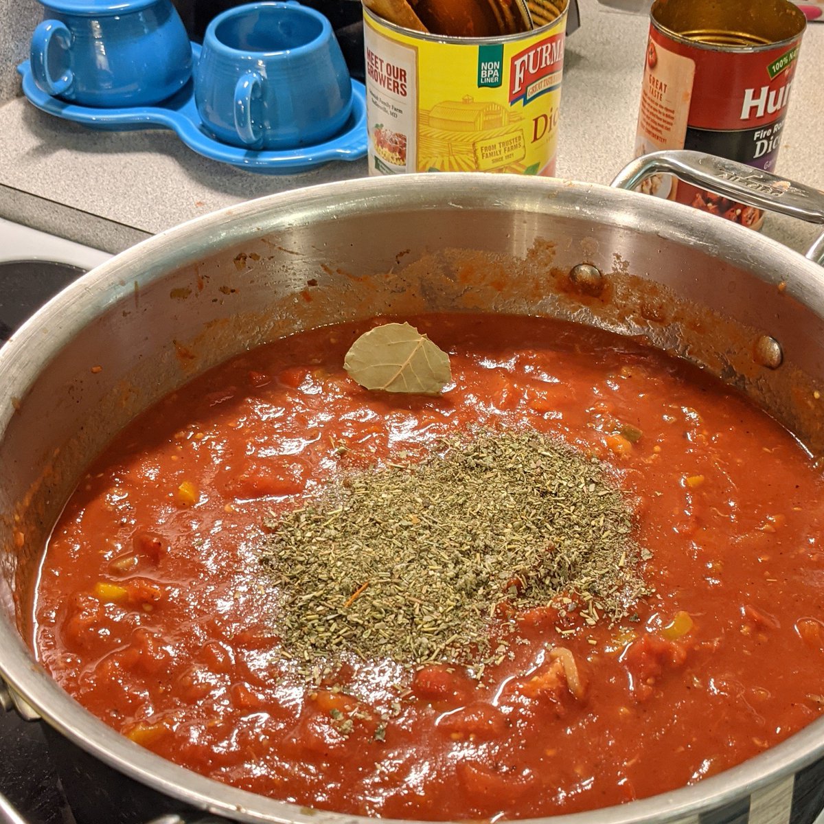 Bay, oregano, crushed red pepper, a little rosemary and thyme. The fresh will go in toward the end. 6/8