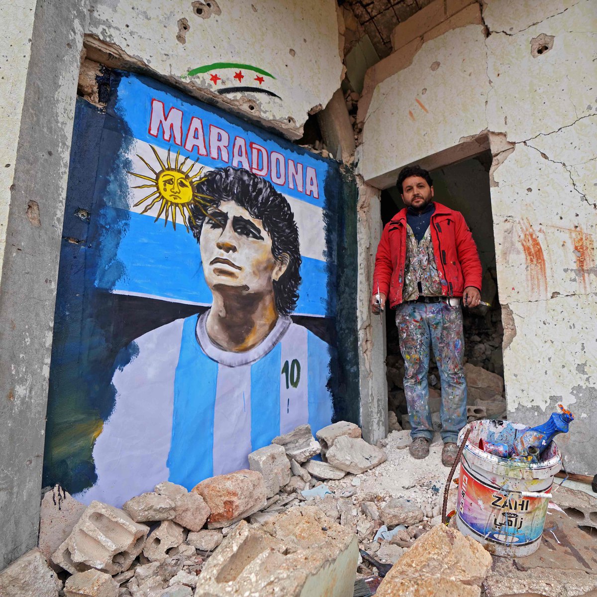 A painter draws a portrait of Maradona on the walls of a destroyed home in Syria. Diego's legacy will live on across the world.