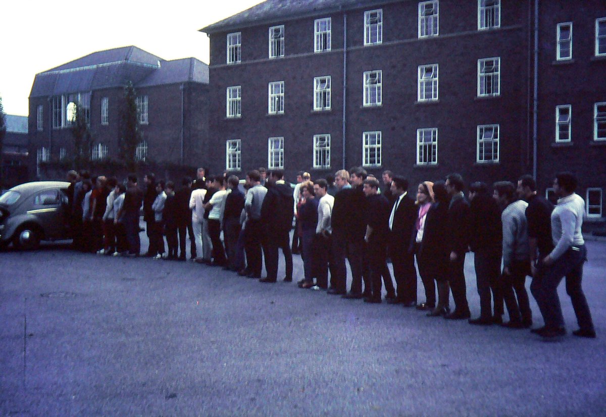 ChesterAlumni's tweet photo. How many students can you fit into a VW? 🚗 The VW Cramming record taking place on Parkgate Road Campus. Photo donated by Brian Pickup (1968). #AlumniHistory #MyChesterStory #ThrowbackThursday https://t.co/VhkJLsNLeG