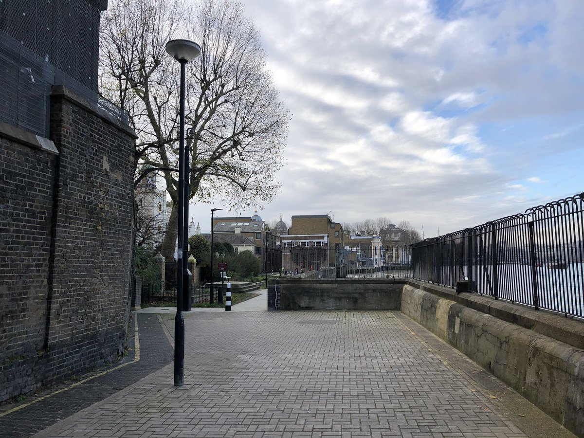 I_Love_SE10's tweet photo. Inspired by yesterday’s @ThamesDiscovery tweet re #Greenwich #PowerStation I thought I’d pop down and do a bit of #ThenAndNow Trying to get @orncgreenwich Domes at the right angle proved difficult. But you can see the #TrinityHospital gate. https://t.co/kzyfZjE9hU