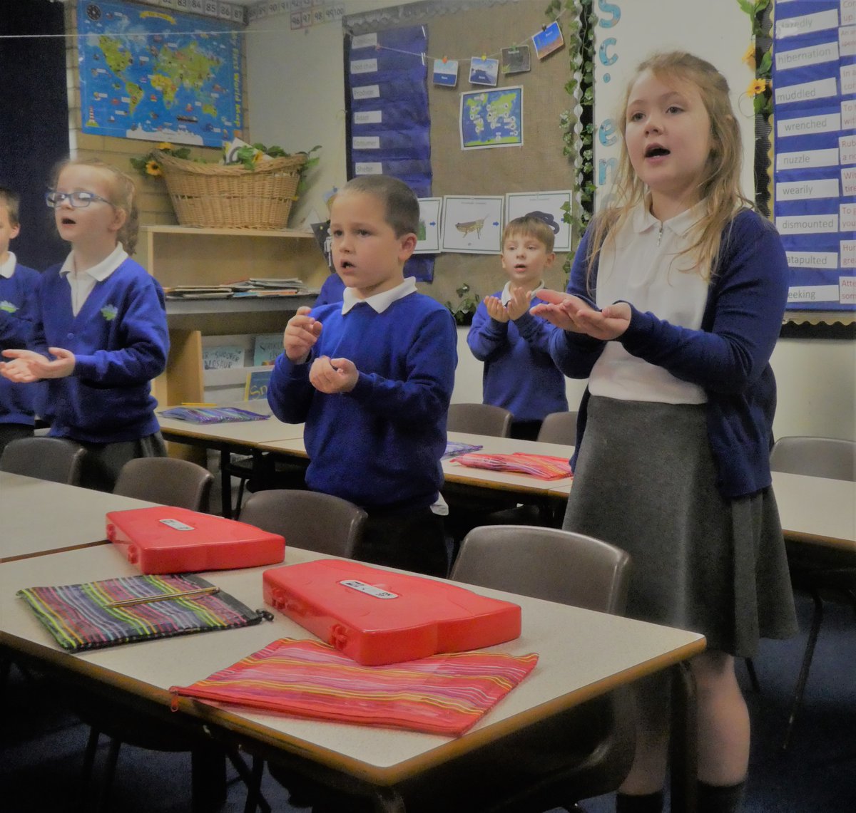 PalacefieldsPS's tweet photo. Year 2 enjoying their music lesson today with our specialist music teacher.  Preparing for their up and coming online performance of a Christmas song using sign language as well as playing some different percussion instruments.  Well Done Year 2! https://t.co/pCQ2fCJdPo