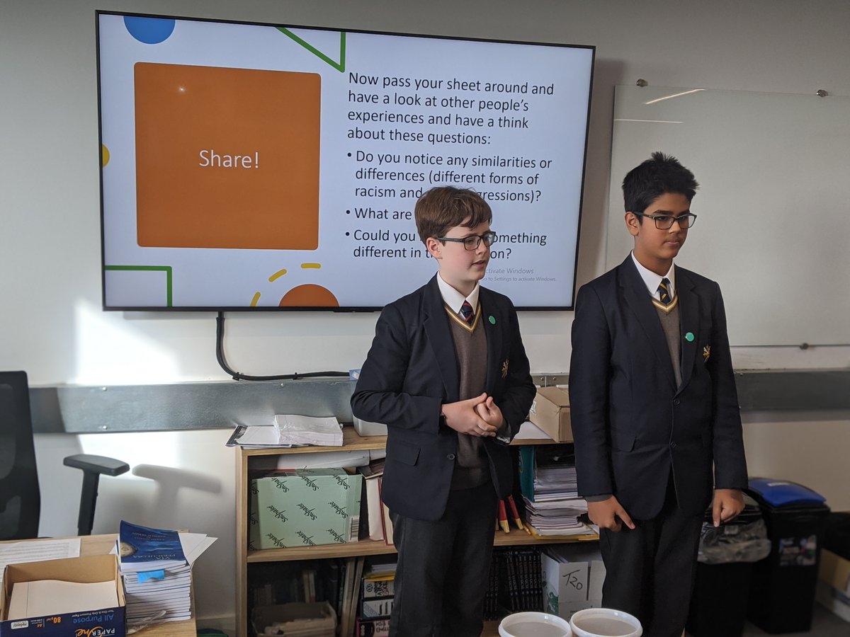 ElthamCollegeUK's tweet photo. We had to share this one! Joshi and Daniel (Year 8) present Mrs Bilsby, Head of Wellbeing with flowers to say "Thank You" for her support and her time in helping set up the Year 8 Change Makers Club! #ElthamFamily https://t.co/2rzk8PxyCB