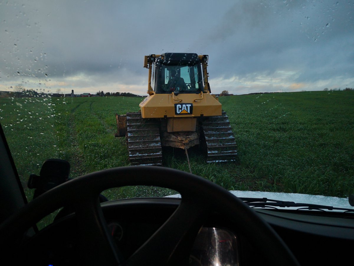 FarmPinegrove's tweet photo. What happens when a drainage plow has a major breakdown? A lot of work and help from other equipment, push it onto the float and too the shop for an overhaul. @FarmPinegrove #tile20 https://t.co/bny6fGf9Ej