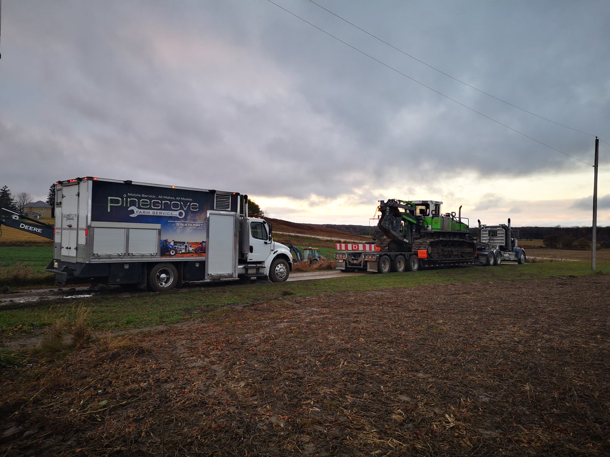 FarmPinegrove's tweet photo. What happens when a drainage plow has a major breakdown? A lot of work and help from other equipment, push it onto the float and too the shop for an overhaul. @FarmPinegrove #tile20 https://t.co/bny6fGf9Ej