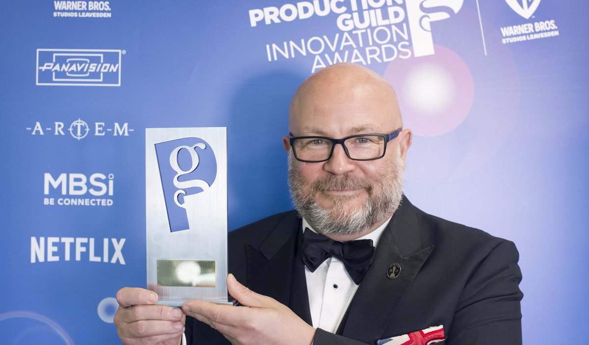 UKScreenSkills's tweet photo. Our Head of Film & Animation @Bedlam_Gareth alongside line producer Georgette Turner and production coordinator Marco Calabrese, has won the @ProductionGuild Innovation Award for a Production Team for our First Day: On Set film. Read more here: https://t.co/yTXKF2CQBm https://t.co/WzXeQzSD9s