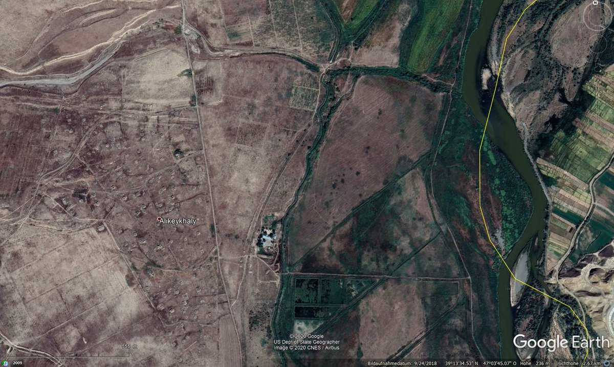 On GoogleEarth images one doesn't say rails anymore, but the typical railway alignment with wide radii and thus distinguishable from typical road alignment makes it easy to follow the former railway line....