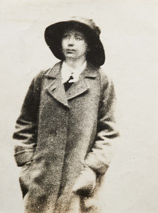 The poem 'Dangerous Coats' by Irish writer Sharon Owens #womensart #poetry Home Office surveillance photograph of suffragette Olive Beamish, 1914