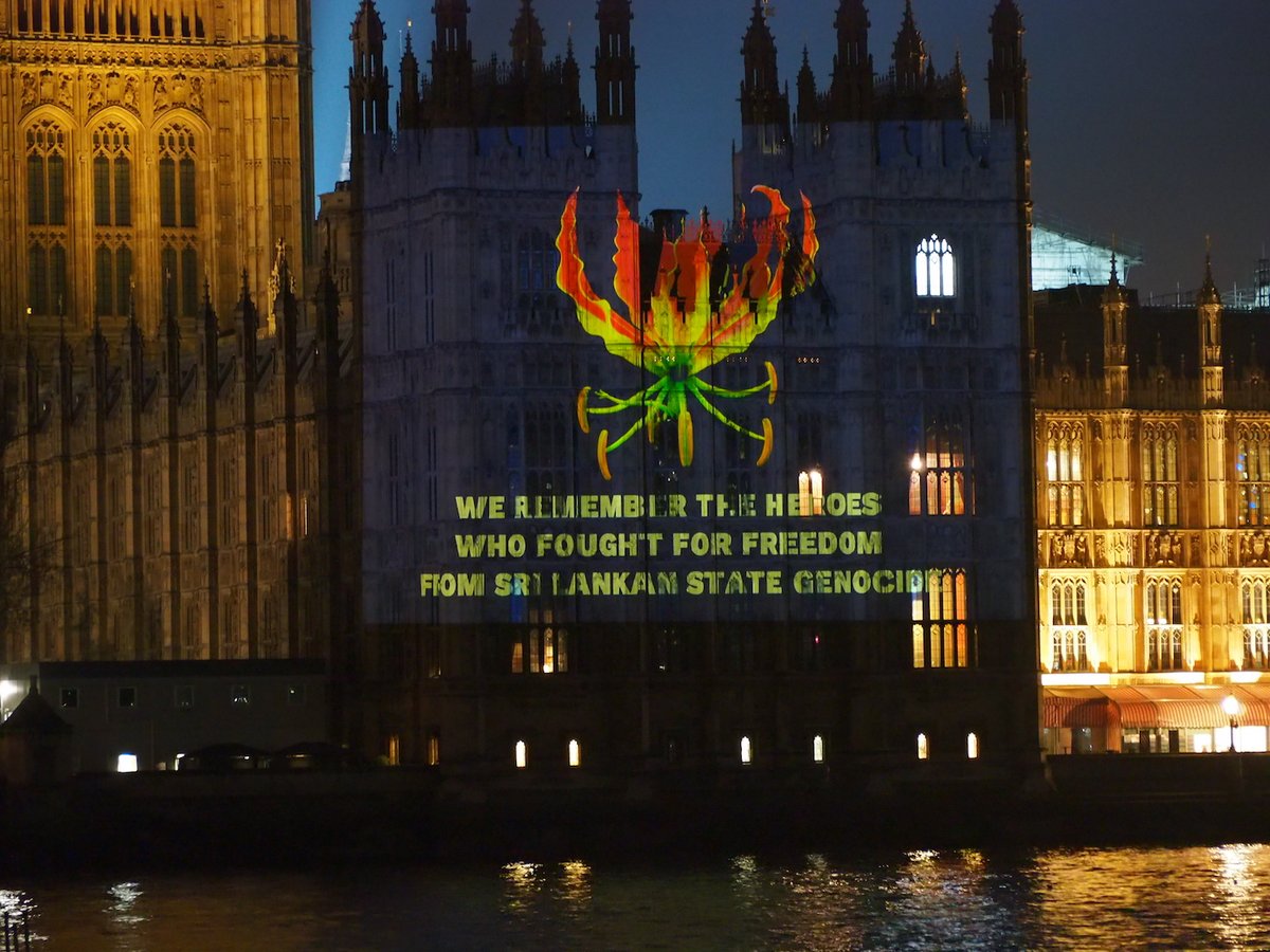 TamilGuardian's tweet photo. More photographs from London where earlier tonight a Karthigaipoo, the national flower of Tamil Eelam, was projected on to Britain's Houses of Parliament to mark Maaveerar Naal.
 
https://t.co/atfXyXysRe #MaaveerarNaal #tamil #eelam #britain #uk #Parliament #lka https://t.co/GCISg9h6zj