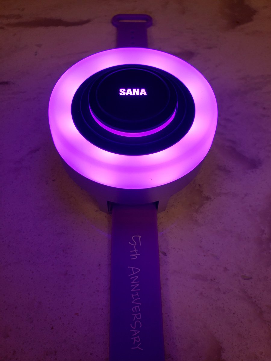 TwiceTLy's tweet image. My light band and 5th anniversary kit finally came in! It&apos;s basically a glorified nightlight since it&apos;s way too big for my baby wrist...but I kinda love it. I feel like a transformation sequence needs to happen every time I put it on 😂