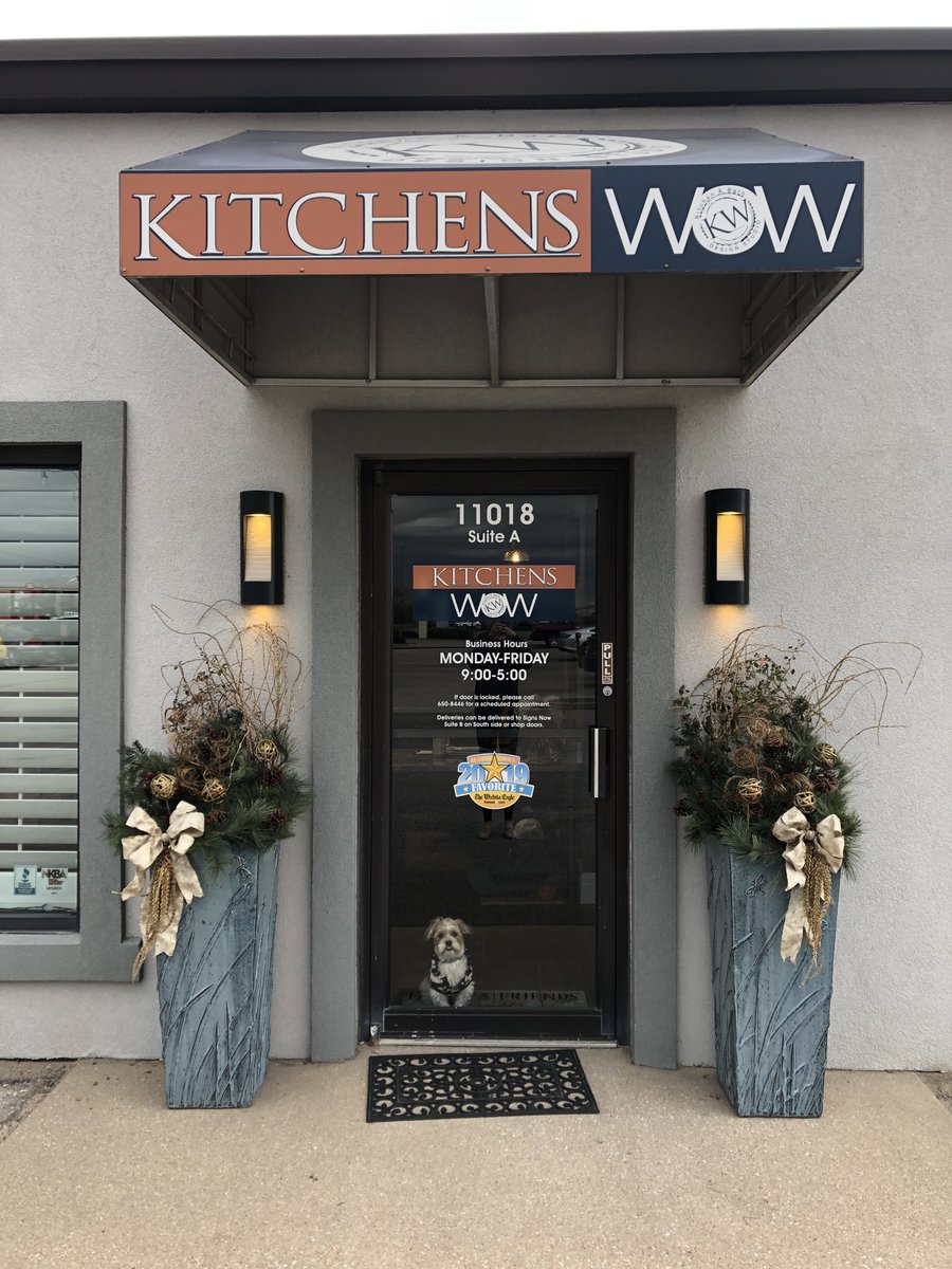 KitchensWowInc's tweet photo. Penelope says it's starting to feel like Christmas! 
We have transformed our office into a Christmas wonderland! Penelope sure does love the tree. 
Drive by at night to see our shop glowing with Christmas cheer. OR even better... stop in to see us any time from 9AM - 5PM!
#kwow https://t.co/SHq23MkaDh