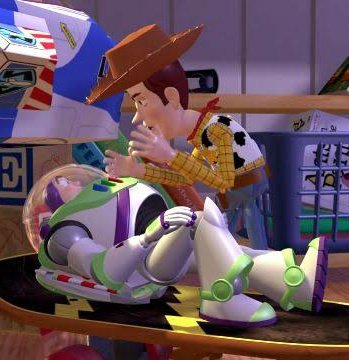 you can't see him but they're holding paws 