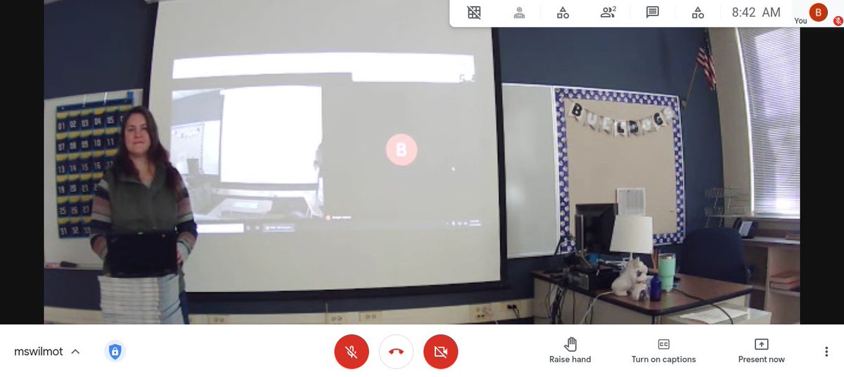 MsWilmot's tweet photo. Loving this new tech setup that places remote students "in" the classroom. I can match teacher movement to content or instructional strategy. Depending on if I am sharing my screen, Ss use Sidebar or Spotlight view in #googlemeet https://t.co/5d7r1tJ1Dt