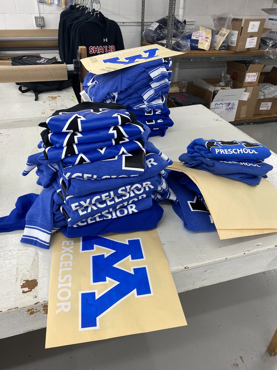 Machines are running. Apparel being laid out. Christmas elves working hard getting apparel done before Christmas!
