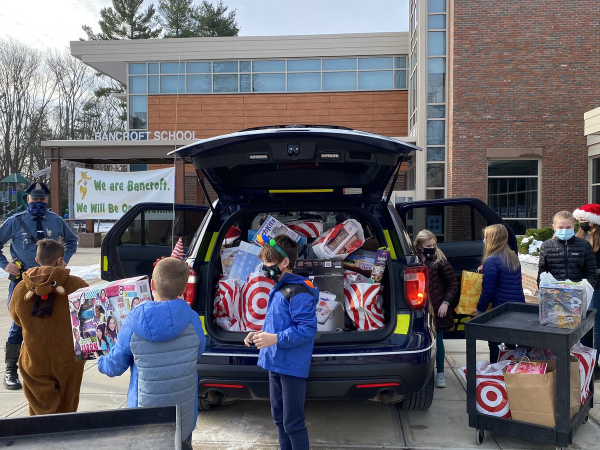BancroftAPS's tweet photo. Another successful collection of Toys for Tots to fill Officer Macallister’s cruiser with toy donations! Thanks to Bancroft Cares Club and all our families for contributing. @BancroftAPS @AndoverPS #weareandover #ToysForTots @mrtharkins https://t.co/o6Oj5c4uwA