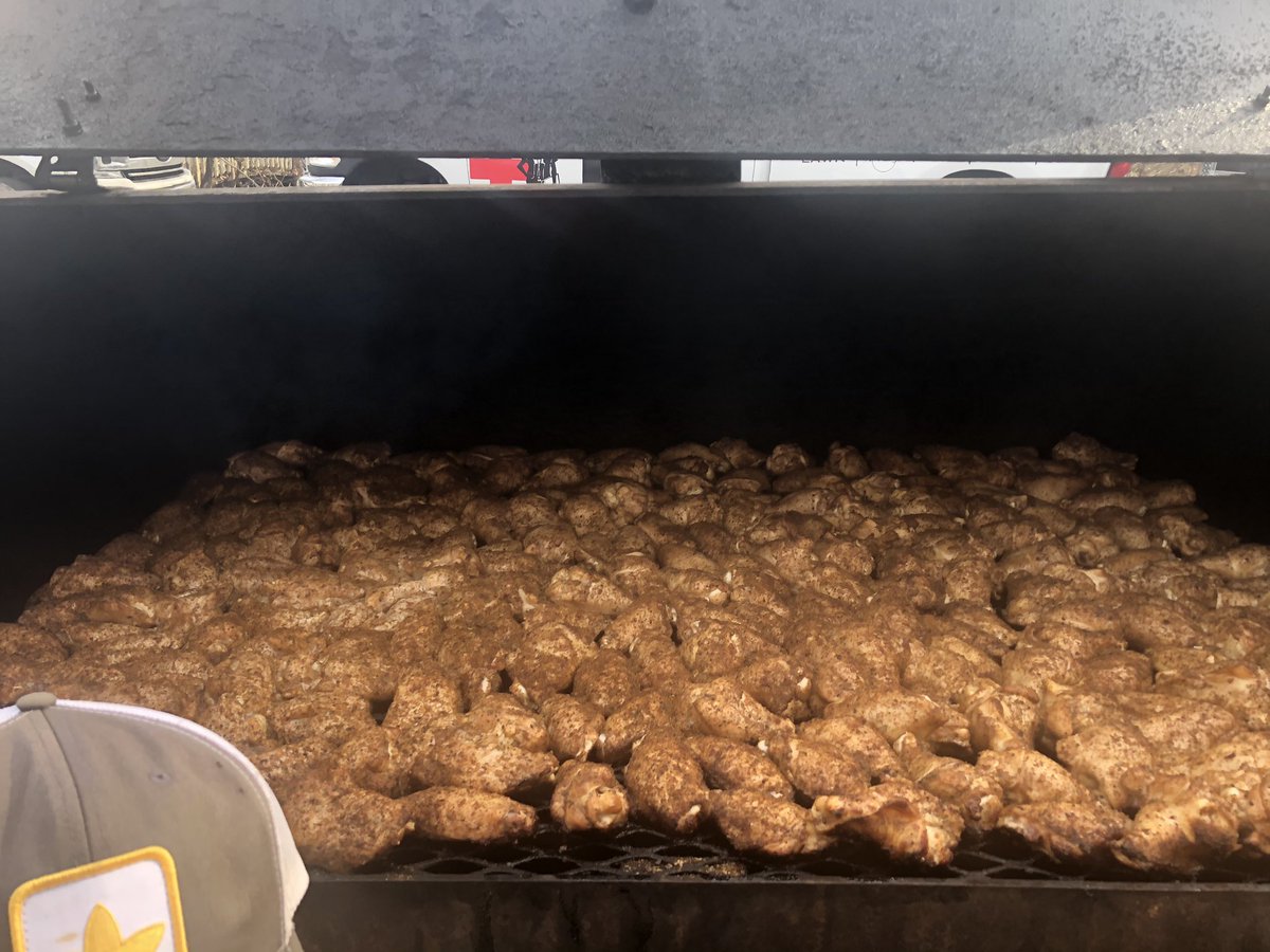 thesimplothat's tweet photo. Smoking wings for 72 turf doctor employees with @RandoT_O @CutshallTrey @SimplotTurf https://t.co/bU38P2i8Z0