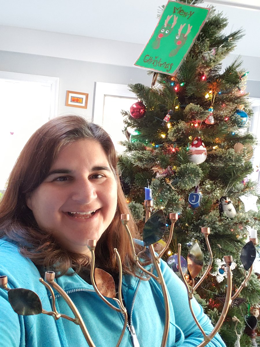 In my house we celebrate Hannukah and Christmas!  You can see my Menorah and my Christmas tree here.  Tonight is the second night of Hannukah, so we will light two candles. #WestgateDaysofCheer <a href="/WestgateElem/">Westgate ES</a>