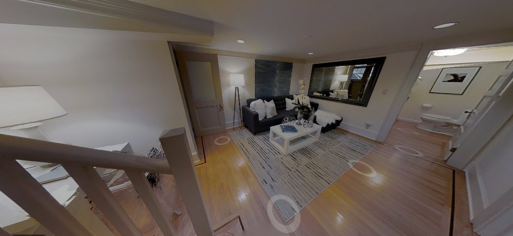 It leads to a downstairs nook complete with its own bathroom. What's that around the corner?