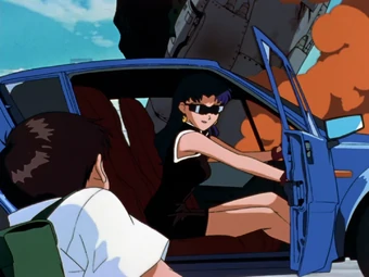 Épisode 1, débarque dans l'histoire à 29 ans, Misato Katsuragi, et l'image qu'elle cherche à montrer d'elle-même est plus qu'évidente.Misato se veut, forte, indépendante et belle (oui, montrer qu'elle est belle est quelque chose qui l'intéresse et pas qu'un peu).