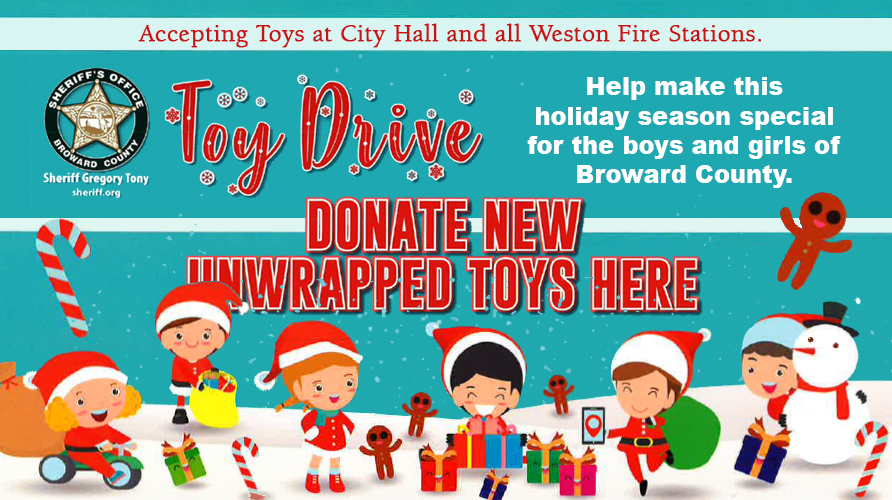 A graphic of elves with gifts and toys. Text reads "DONATE NEW UNWRAPPED TOYS HERE"