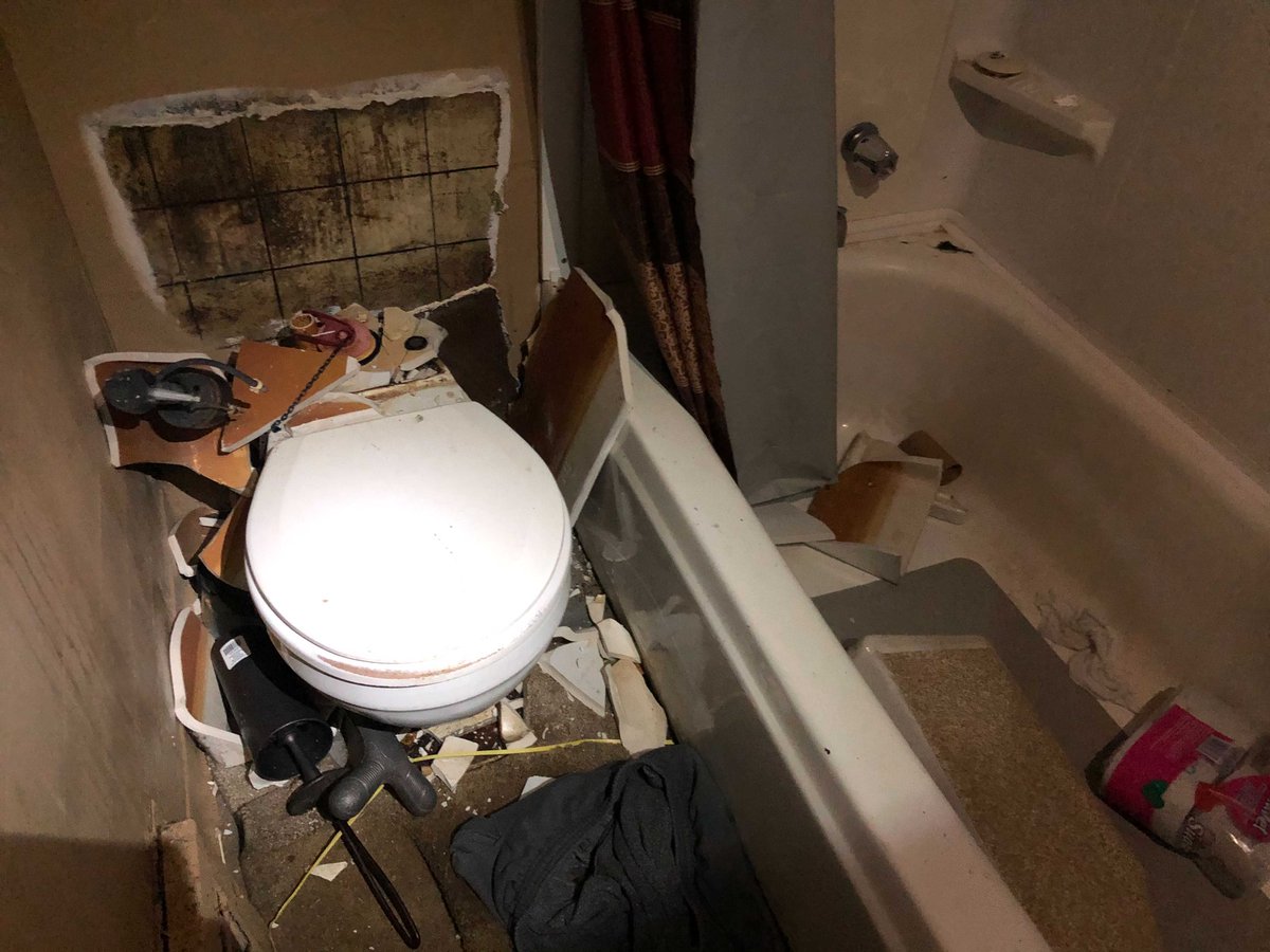 Nietzche and his mother, Julie Metcalf Kinney, 62, led me to the downstairs bathroom, which they said was the most heavily damaged room that day. Pieces of the broken sink and toilet rested on the floor and inside the bathtub.
