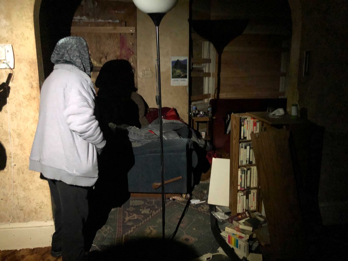 Metcalf Kinney walked me into the living room, where VCR tapes and couch cushions were strewn on the floor. “It’s very hard to keep myself from even crying. When my sons were taken, it just completely terrorizes me because they had taken my eldest son for years," she said.