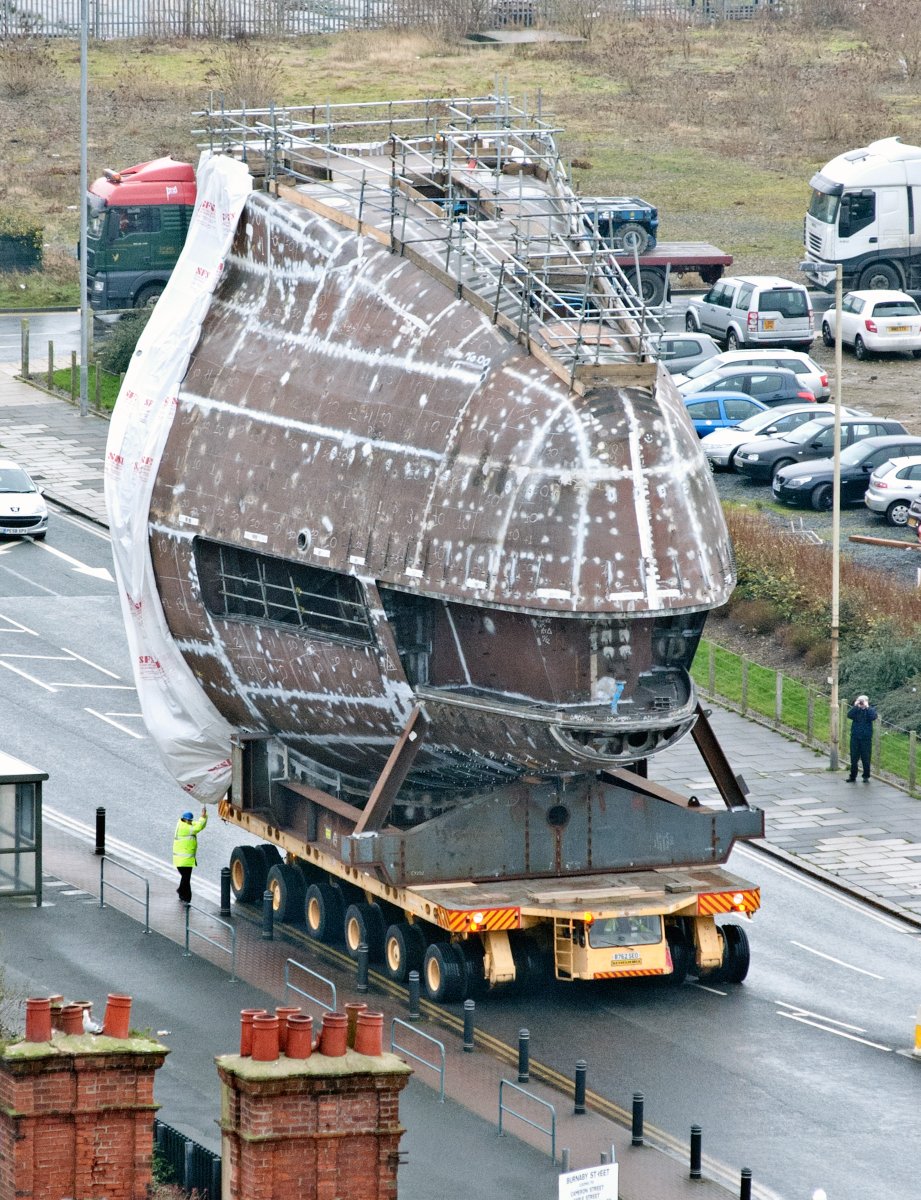 BAES_Maritime's tweet photo. Submarine units heading down the highway are a sight unique to Barrow in Cumbria. In the case of this unit, the finished sub is being officially named this week.
See the event at https://t.co/sbmsdvVPdB
 #Anson #Barrow #Submarines . @BrilliantBarrow @RoyalNavy  @cumbrialep https://t.co/dDUfLVSFXr