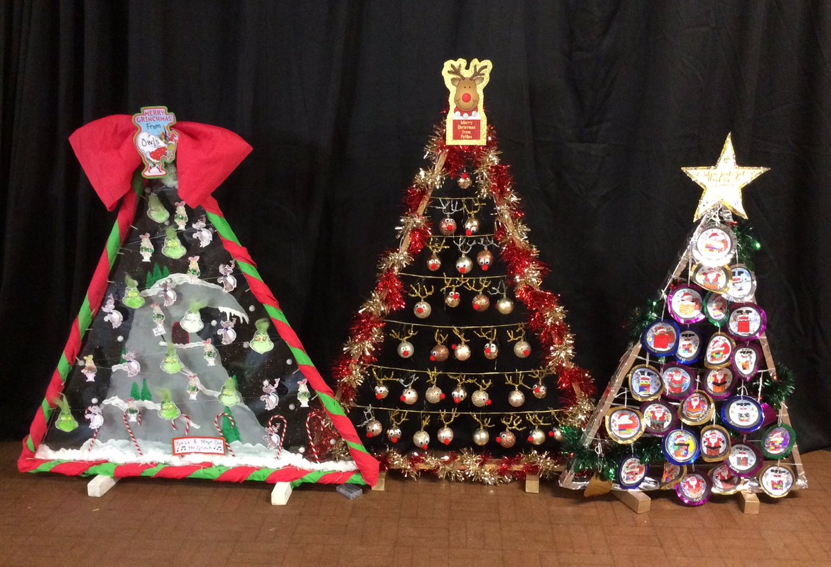 AlvertonCW's tweet photo. One of our Christmas traditions (which we can still do this year!) is our class Christmas trees. This year’s theme is Cheesy Christmas Songs and the trees are looking amazing! @alvertonschool https://t.co/SZ0PRfe38b