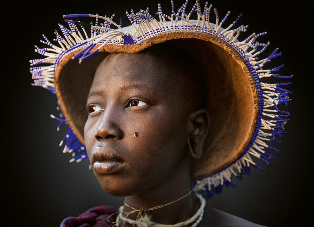 #Vulnerable —Tradition &amp; modernity: The dedicated #photographer #OlgaMichi visited indigenous people around the world, taking one-of-a-kind portraits of them. The images both reveal the essence of these people and show their current life situations. More: bit.ly/33VgUYv