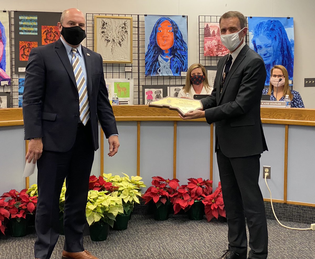 Tuesday Carteret County Board of Education meeting John McLean, left, recognized Superintendent Dr. Rob Jackson for receiving the NC High School Athletic Association’s Bob McRae Superintendent of the Year Award.