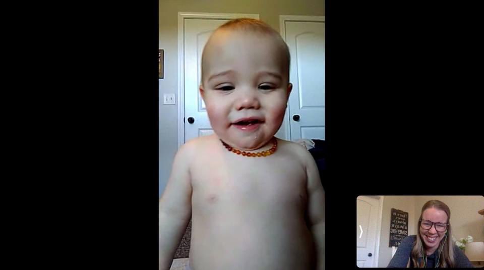 katie_carlson's tweet photo. Beckham is growing up thinking Zoom & FaceTime are just a normal part of the day. Kris sent this picture to me, 1/2 through the day 😂, Bryce decided to change out of his pjs so Beckham took over his computer waving at the blank screen & wanting to wear headphones.
#2020isweird https://t.co/iXtjNIM8C2