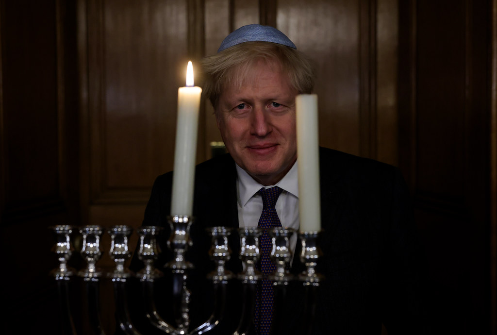 Tonight Prime Minister <a href="/BorisJohnson/">Boris Johnson</a> and Jewish members of staff lit the Chanukiah to mark the start of #Chanukah
 
#ChanukahSameach from Downing Street!