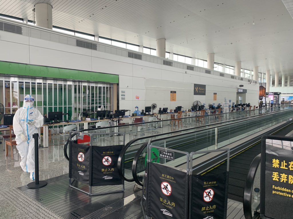 After a 12-hour flight, I’m welcomed in my lovely hometown Guangzhou by more staff fully armored in PPEs.Every passenger receives a number and a barcode that will follow them through the health check procedure at the airport.